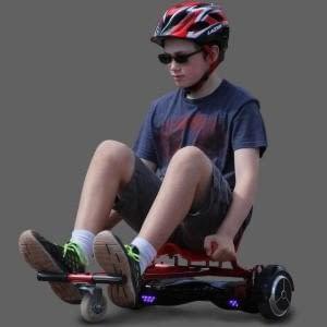 Riding a red GlideKart hoverboard seat attachment by Ride the Glide