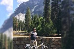 Happy customer travelling with his e-bike
